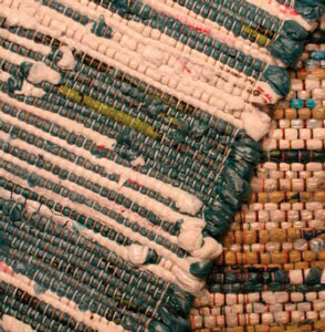 Look like colorful woven fabric? Guess again. These rugs are woven plastic grocery bags.